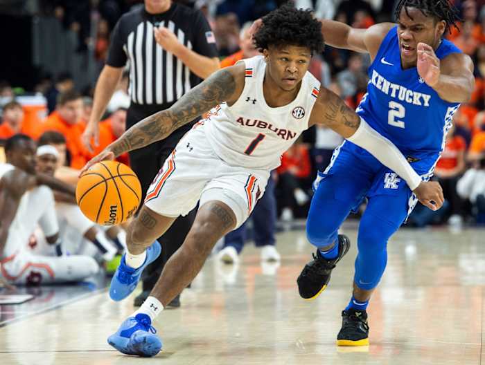 Auburn Tigers guard Wendell Green Jr. (1) drives the ball as Auburn Tigers men's basketball takes on Kentucky Wildcats at Auburn Arena in Auburn, Ala., on Saturday, Jan. 22, 2022. Kentucky lead Auburn 33-29 at halftime, but the Tigers came out hot and held on for an 80-71 victory.